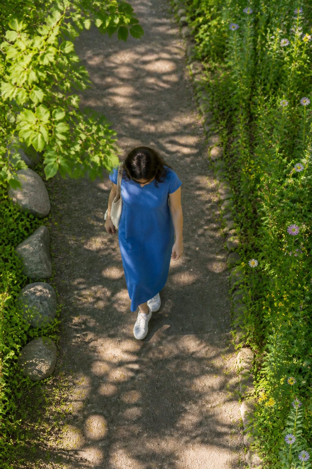 Model wearing a Midaxi T-Shirt Dress in a relaxed outdoor setting.