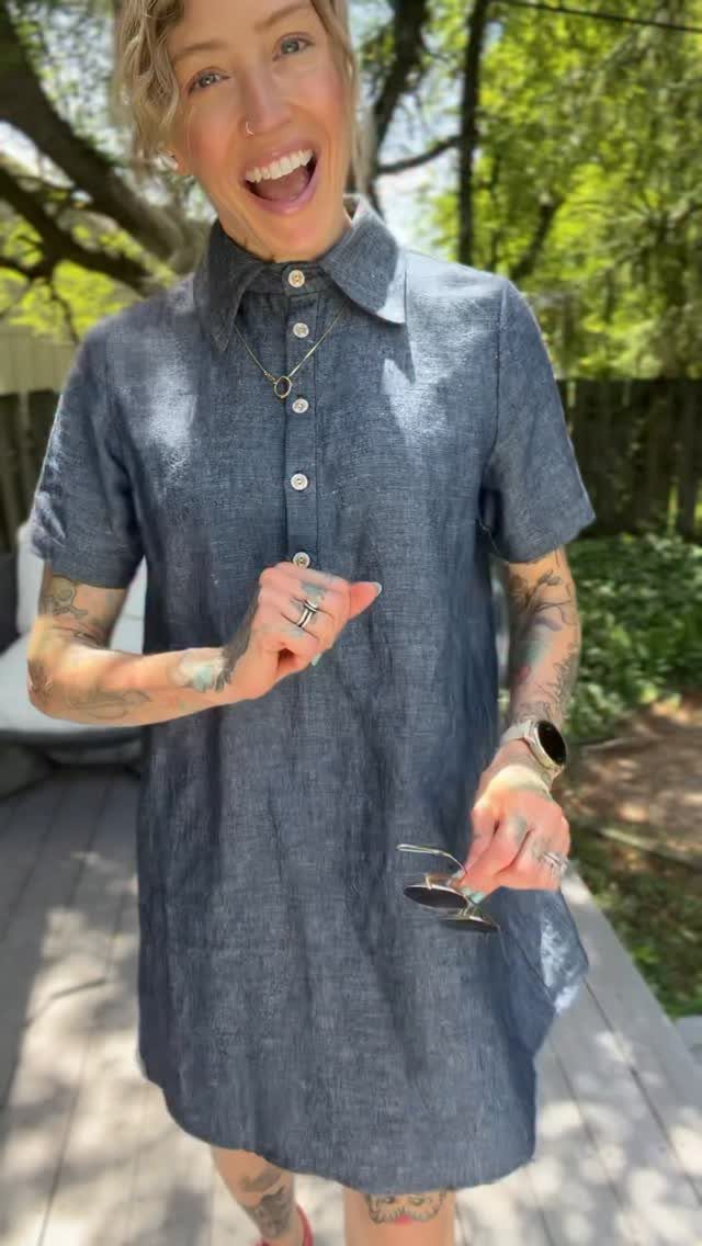 Casual Summer Outfits: 10 Easy Ideas for Daily Wear 7 Smiling woman with tattoos wearing a blue short-sleeved chambray shirtdress outdoors.