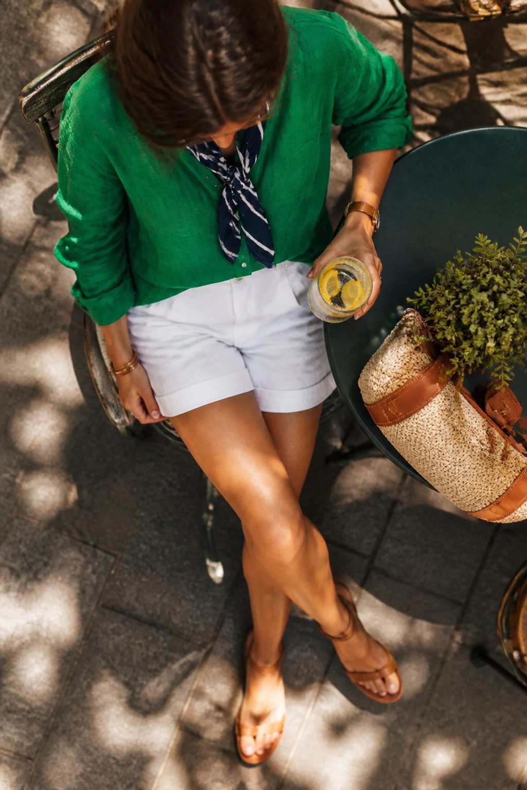 How to Style White Shorts: 6 Outfit Ideas for Any Occasion 9 A bright top paired with white shorts.