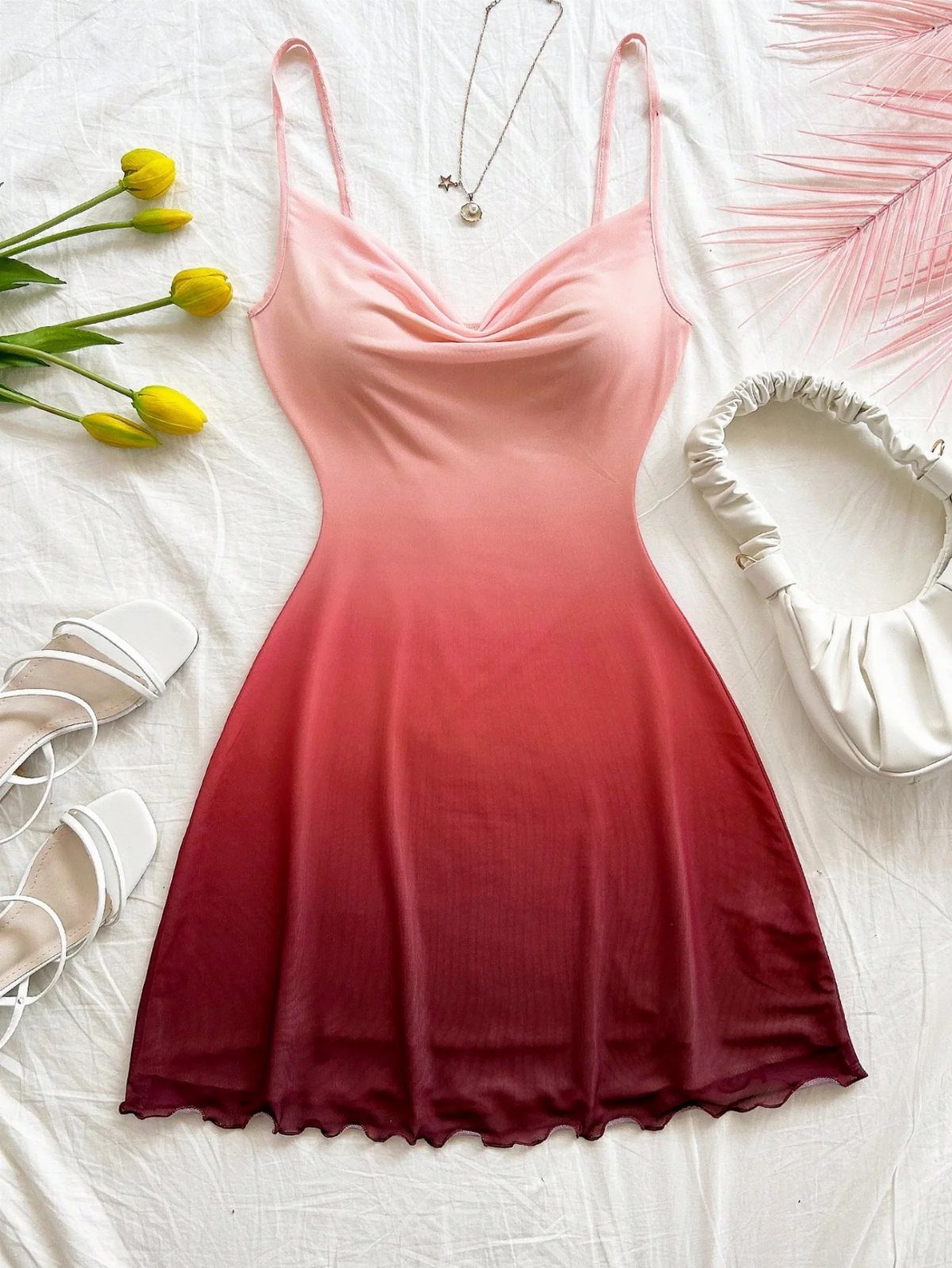 Red Summer Dress: 6 Looks for Warm Days and Nights 4 Pink and red ombre spaghetti strap mini dress with white sandals and a white handbag.
